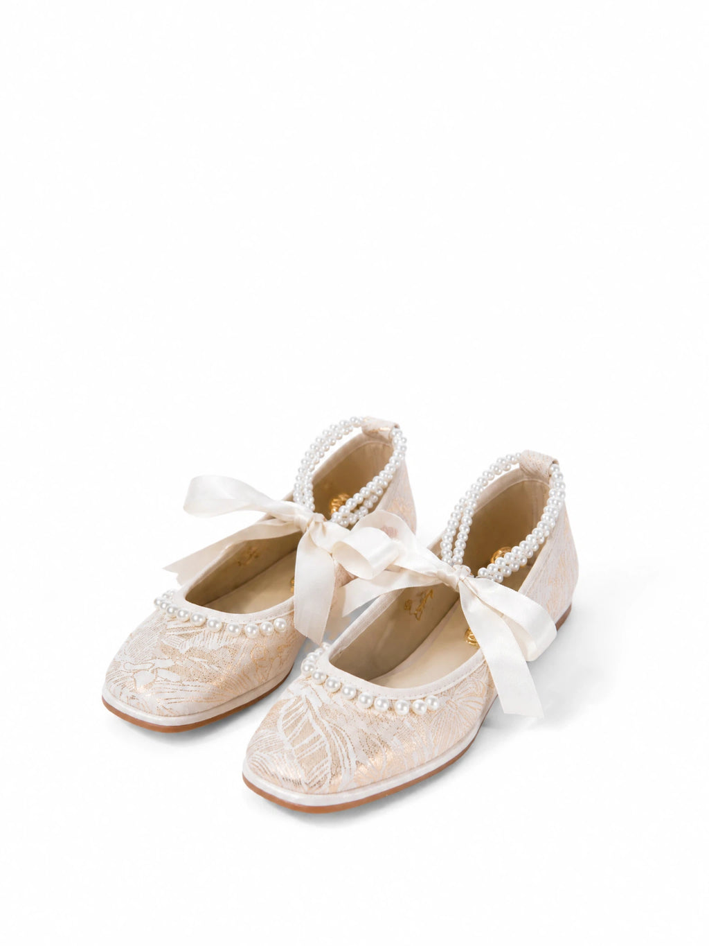 Full product flatlay with pearl embellished satin bow Mary Jane shoes